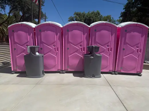 Hand wash stations beside event porta potties